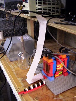 two stage ion wind machine, on, note paper strip.